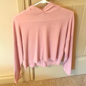 A cropped sweater
